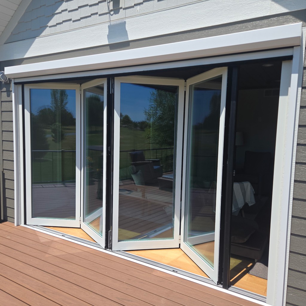 White NanaWall bifold door to deck