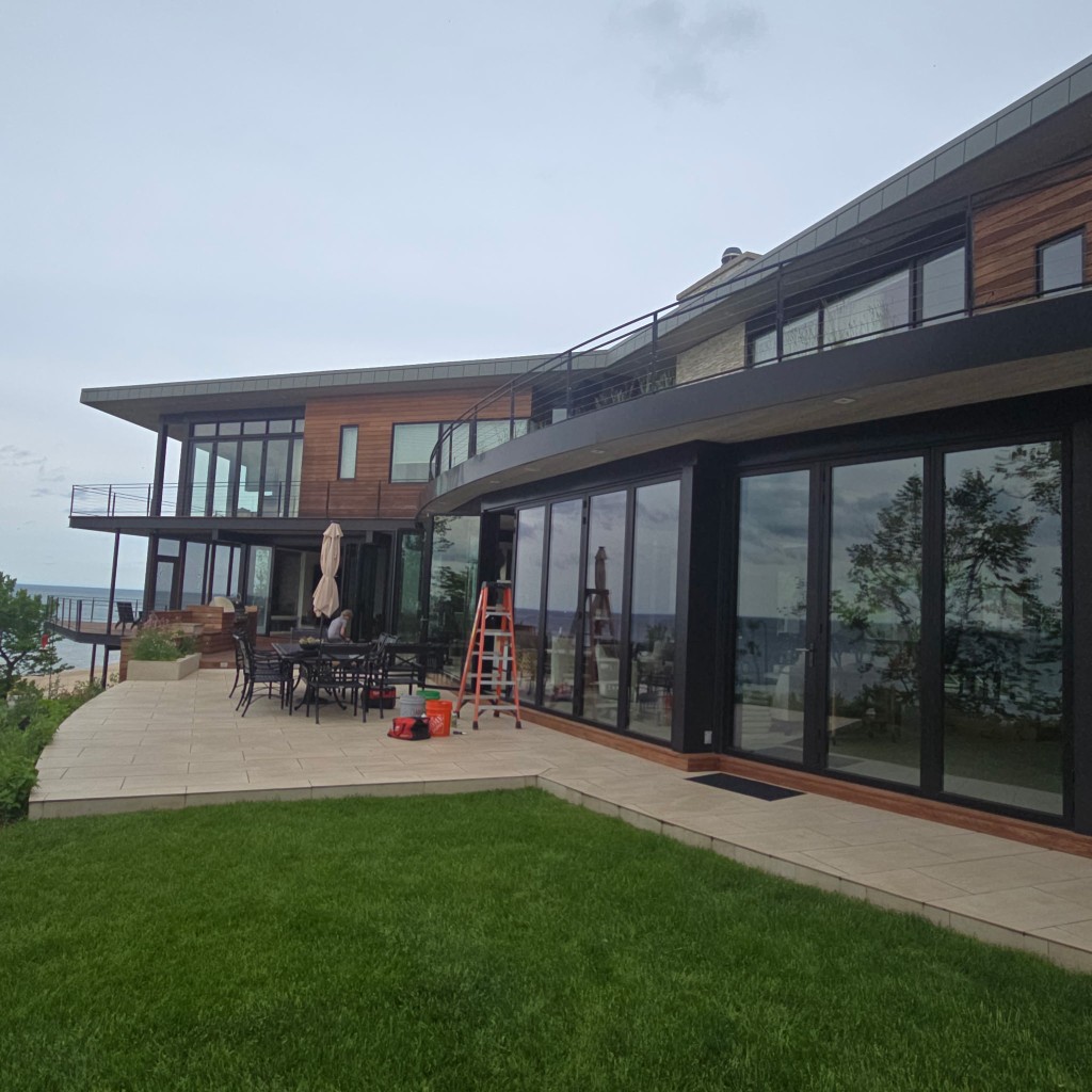 Lakeside home construction with NanaWall install